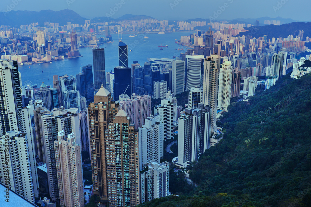 View point of Hong Kong city and Kowloon city from the top of Victoria peak, Hong kong island, China.