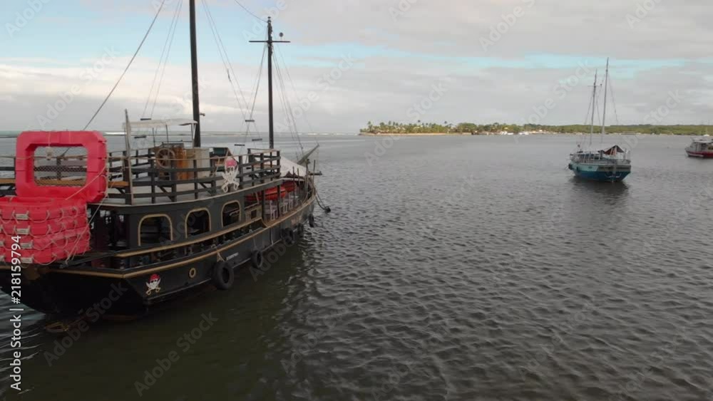4K Cinematic Aerial flythrough over a massive boat anchored just offshore in Porto Seguro Brazil! 4K Cinematic Aerial flythrough over a massive boat anchored just offshore in Porto Seguro Brazil!