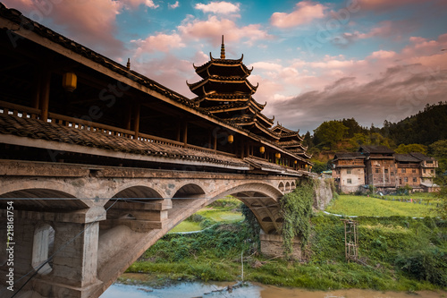 Old wind and rain bridge in Chengyang Dong village, Guangxi, China photo