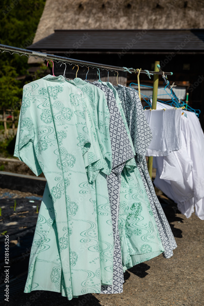 Drying kimono on hangers in traditional and historical Japanese