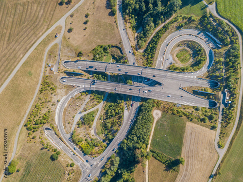 Aerial view of highway bridge and tunnel entrance in Switzerland, Europe