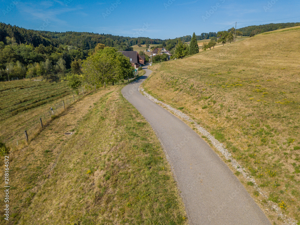 Aerial view of road through rural area in Switzerland Aerial view of road through rural area in Switzerland