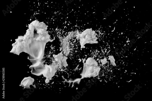 Shaving foam isolated on black, with clipping path texture and background, top view