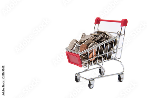 Shopping cart full of coin on white background