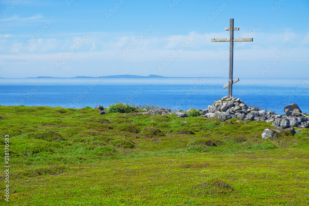 Wooden cross on the shores of the White Sea Wooden cross on the shores of the White Sea