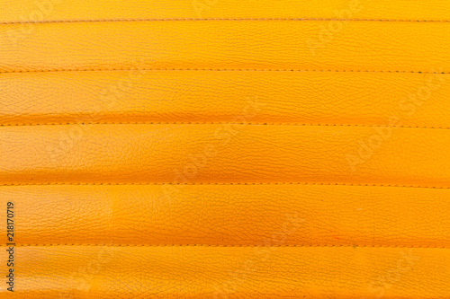 Yellow leather sofa close up