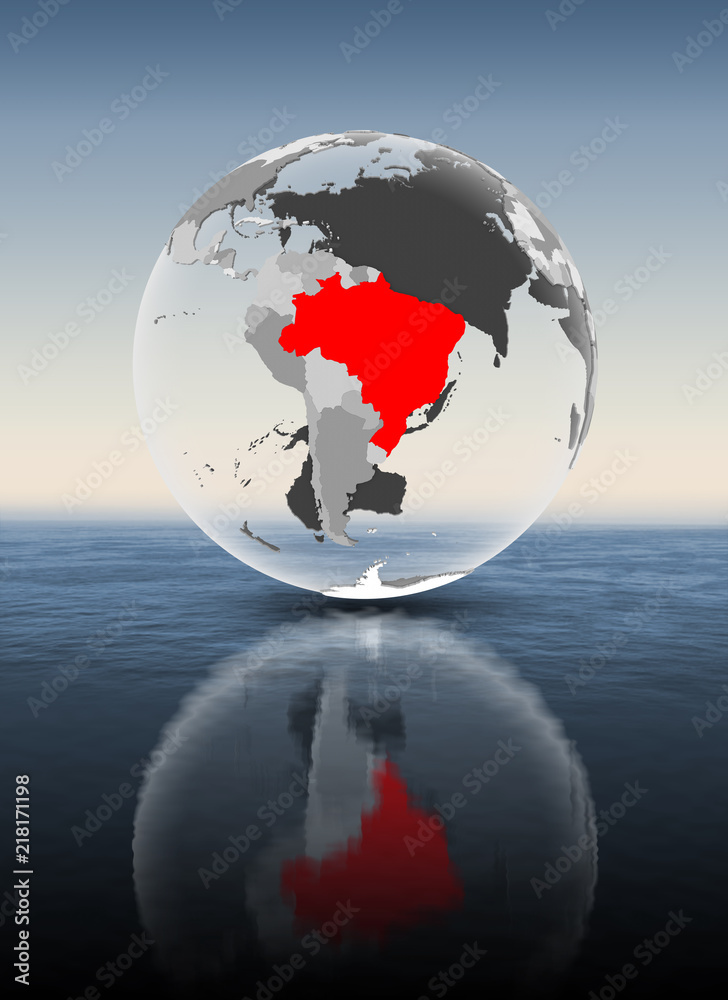 Brazil on translucent globe above water Brazil on translucent globe above water