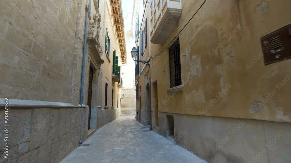 Rear view tourist woman Walking narrow streets of Barcelona Wearing cute summer dress enjoying European summer holiday travel vacation adventure Rear view tourist woman Walking narrow streets of Barcelona Wearing cute summer dress enjoying European summer holiday travel vacation adventure