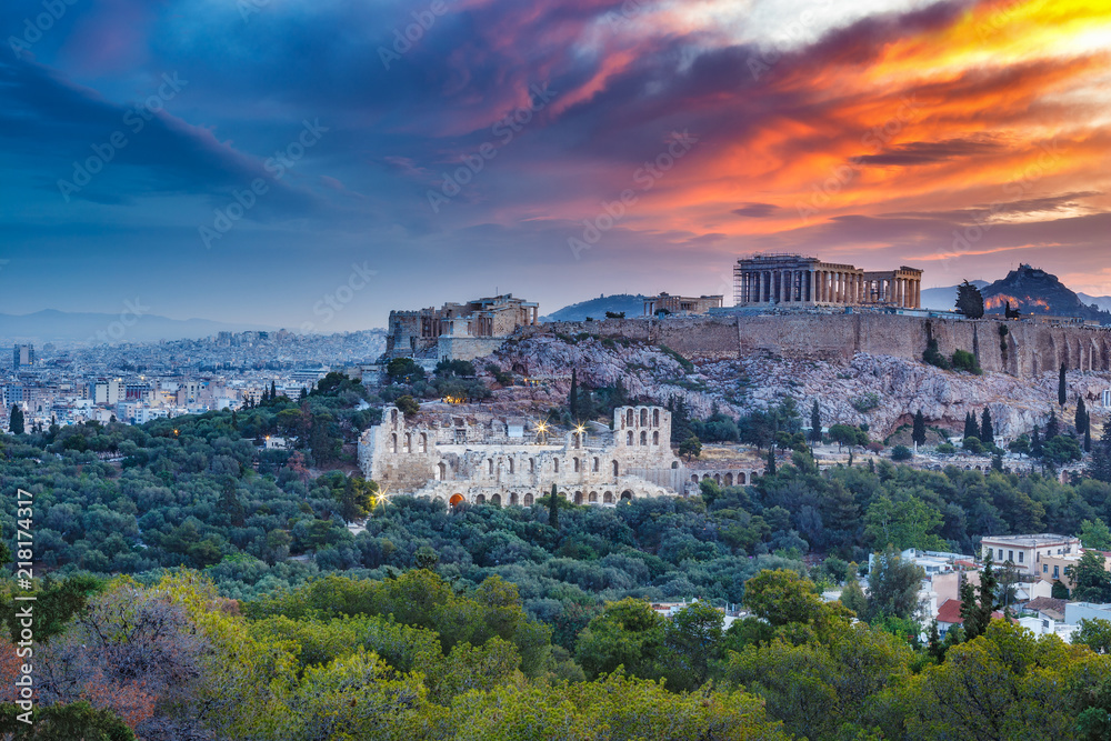 Panorama view on the the Acropolis in Athens, Greece at sunrise. Scenic travel background with dramatic clouds.