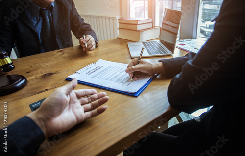 Canvas Print Signing a joint venture investment agreement in front of witnesses