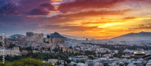 Panorama view on Acropolis in Athens, Greece, at sunrise. Scenic travel background with dramatic sky.