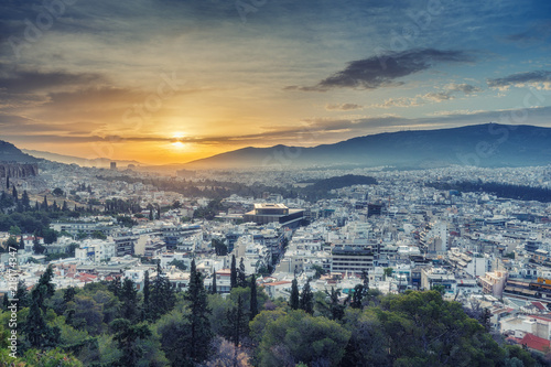Panorama view on Athens, Greece, at sunrise. Scenic travel background with dramatic sky.