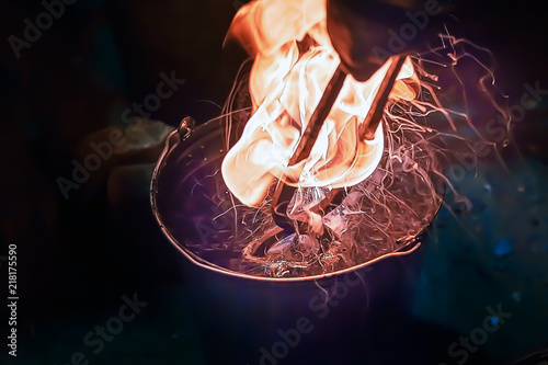 Bilde på lerret Hardening the parts in the forge flames