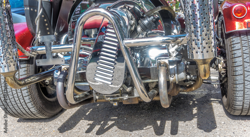 Chromed engine block of a trike.