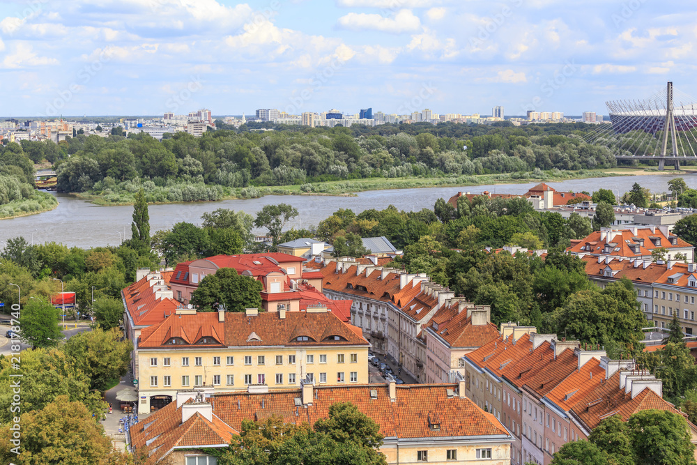 View from viewing terrace on tower of church of St. Anna on part of city called Mariensztat and on Vistula with Praga district located on other bank 