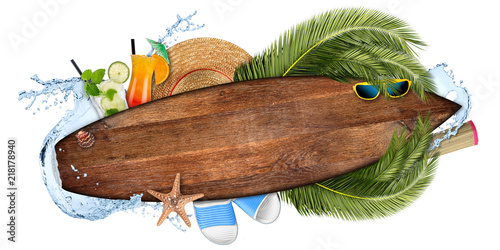 beach summer cocktail bar concept tourism background empty wooden surfboard with copy space coco palm water splash straw hat and seastar isolated on white photo