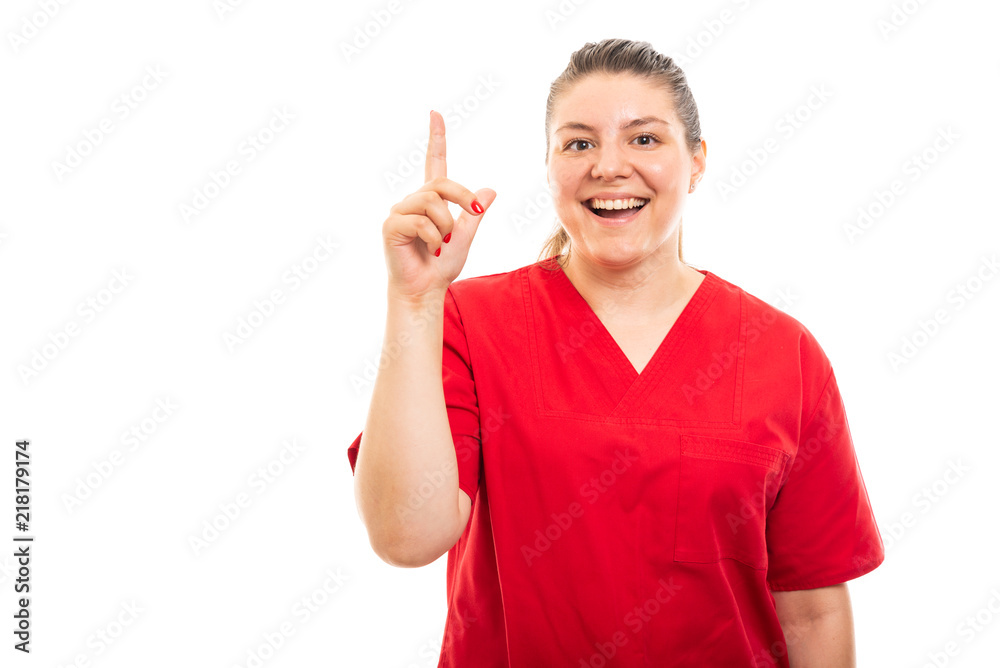 Young medical nurse wearing red scrub showing got idea gesture. Young medical nurse wearing red scrub showing got idea gesture.