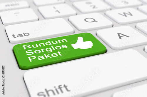 Computer-Tastatur mit einer grünen Taste und der Aufschrift Rundum Sorglos Paket photo