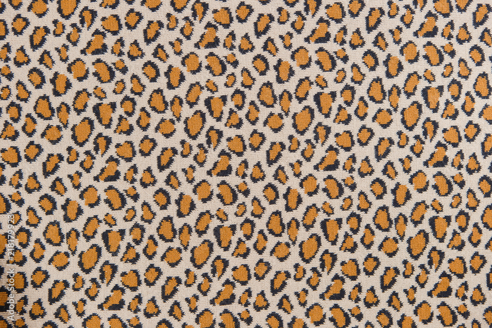 Closeup leopard pattern cotton knitted textile as background Closeup leopard pattern cotton knitted textile as background