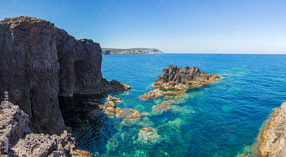Rock formations on the cliffs of the island of San Pietro in Sardinia, Italy.