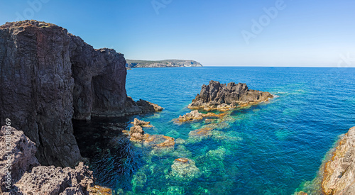 Rock formations on the cliffs of the island of San Pietro in Sardinia, Italy. © serghi8