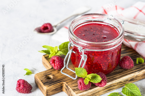 Strawberry jam in glass jar. photo