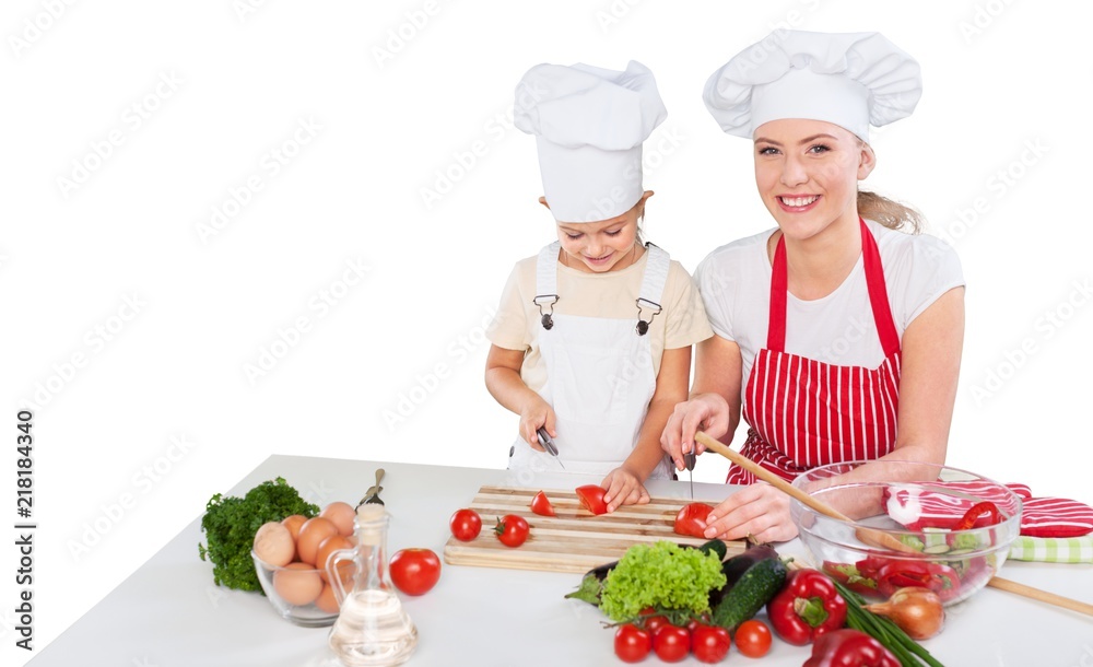Mother and Daughter Cooking Together Isolated Mother and Daughter Cooking Together Isolated