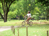 Senior Couple cyling in Park.Health care concept.