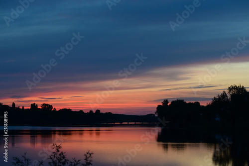 Sunset on a river © Евгений Рукавицин