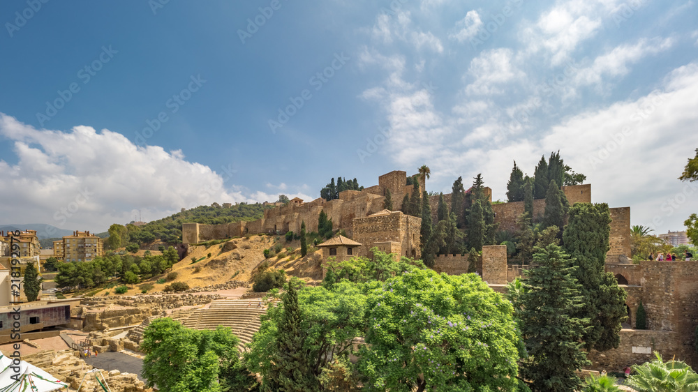Panorama view of the roman theatre and The Alcazaba, arab castle in Malaga, Spain on a sunny day.
