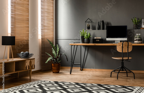 Dark grey workspace interior photo