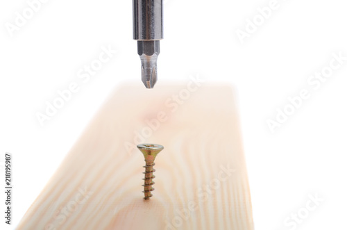 Stainless Steel  Wood Screws in use, screwing screw into a wood.