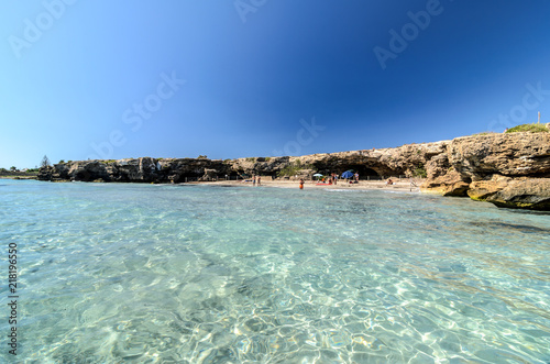 Beautiful crystal clear water at Cittadella dei Maccari, San Lorenzo, Nature Reserve Oasis of Vendicari, Syracuse, Sicily, Italy, Dreamy and idyllic spring holiday destination near Noto and Marzamemi.