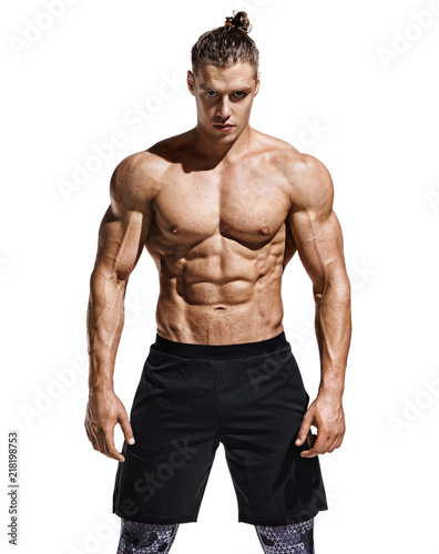 Foto Stock Sporty man with perfect body after training isolated on white  background. Strength and motivation | Adobe Stock