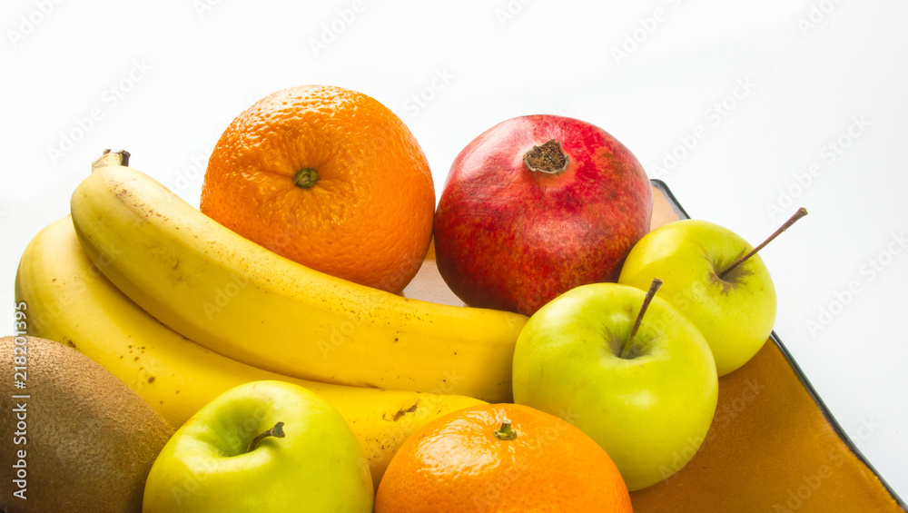 Assortment of exotic fruits on white background, close-up Assortment of exotic fruits on white background, close-up