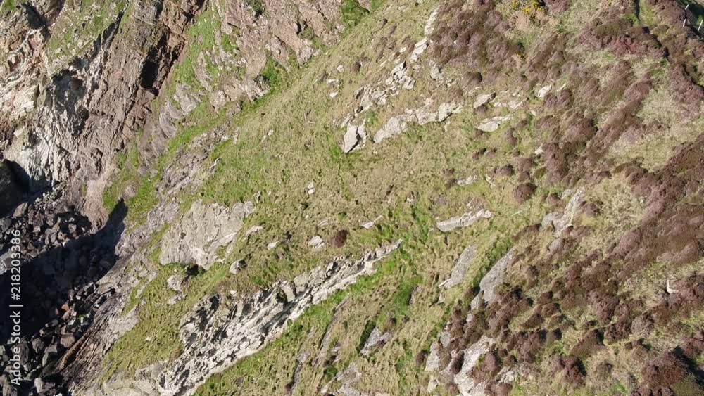 Aerial view of the beautiful cliffs close to the historic South Stack lighthouse on Anglesey - Wales Aerial view of the beautiful cliffs close to the historic South Stack lighthouse on Anglesey - Wales