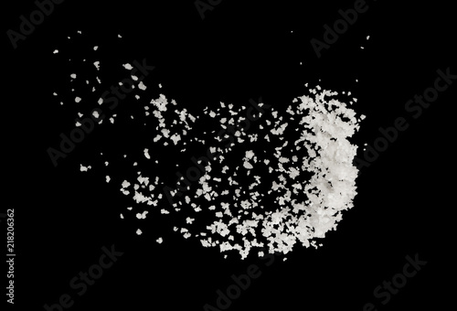 Salt splash explosion  isolated on black background , freeze stop motion