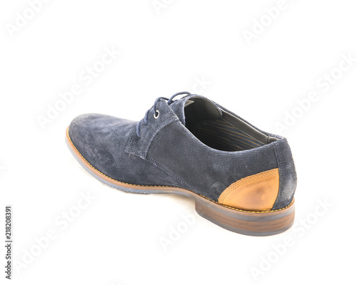 Close-up brand new one dark blue men blucher shoes isolated on white background. Formal dress code for man photo