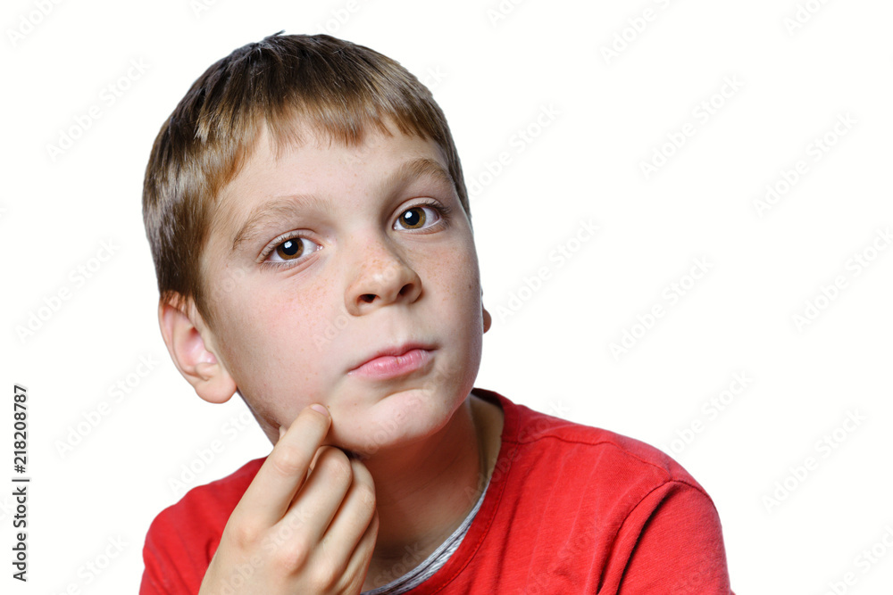 Portrait of a boy, close-up, serious, thinks Portrait of a boy, close-up, serious, thinks