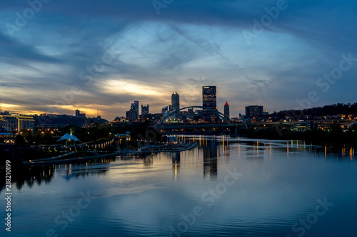 The city of Pittsburgh at sunset with clouds taken above the Ohio River
