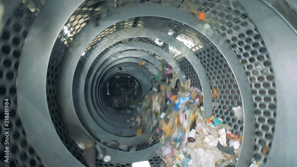 Garbage recycling machine during working process. Garbage sorting plant.