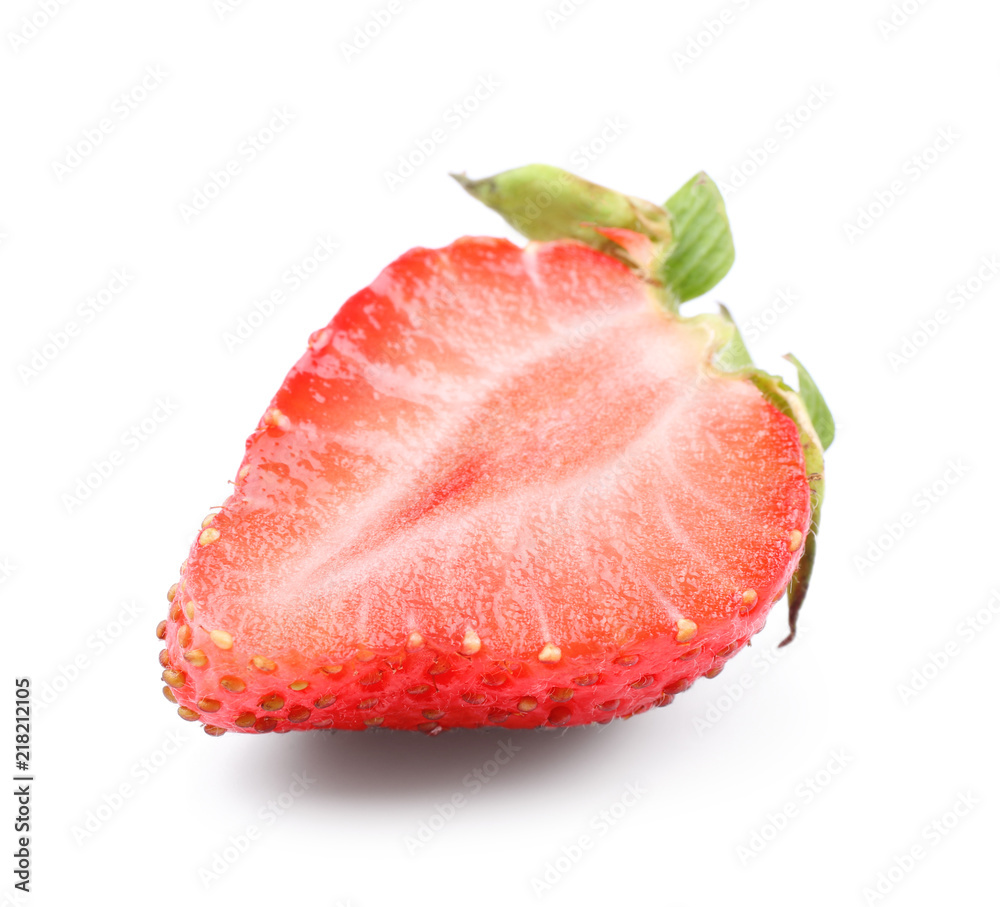 Half of ripe strawberry on white background Half of ripe strawberry on white background