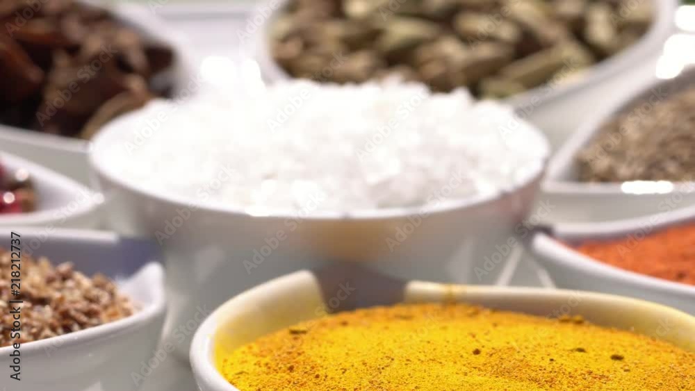 Dry spices on a rotary table. 4K. Macroshooting. Dry spices on a rotary table. 4K. Macroshooting.