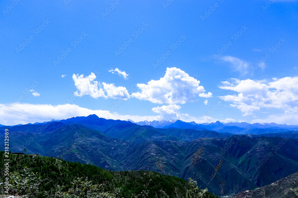 Green and High Mountains under the Blue Sky Green and High Mountains under the Blue Sky