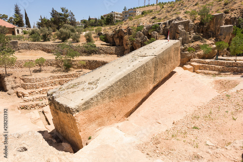 The Stone of the Pregnant is the largest carved stone in the world and lays unfinished in its quarry near the Baalbek roman temple complex, Lebanon. photo