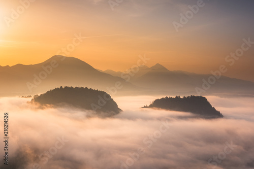 Sunrise over the Alps mountains at foggy morning in Bled, Slovenia