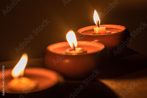 Candle light fire lamp.Religion abstract background concept. Earth hour