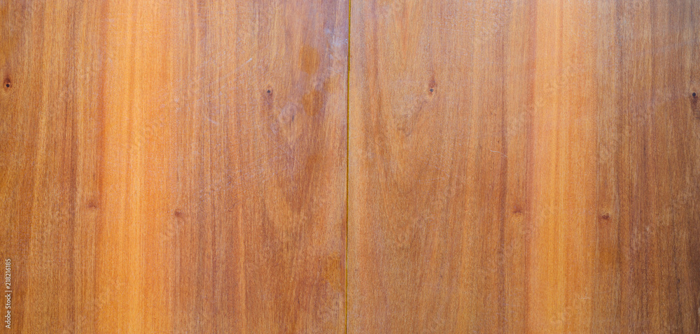 Obraz premium Book-Matched Wood Panels Background. Joints of Decorative Finishing from Wood Panels on Interior, Exterior Walls or Kitchen Facades. Mirror Matching Pattern of Two Wood Wallboards