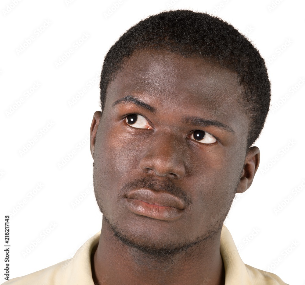 Obraz premium Portrait of young handsome african man isolated on white