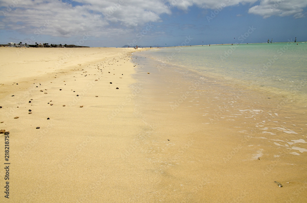 Clear tuquoise waters of Atlantic Ocean on Sotavento beach on Fuerteventura, Canary Islands